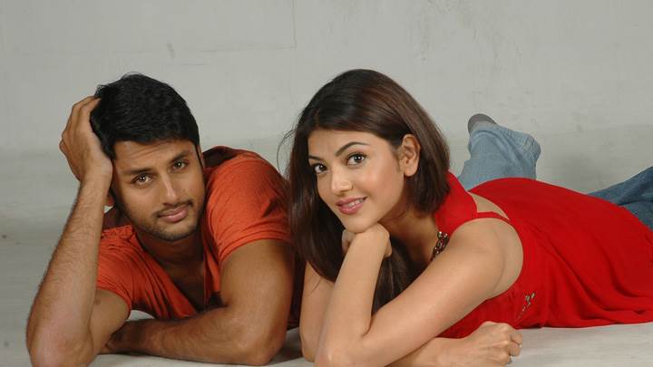 Kajal Aggarwal And Nitin Laying Pose In Red Dress – Aatadista